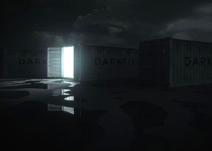 Darkfield container with door open